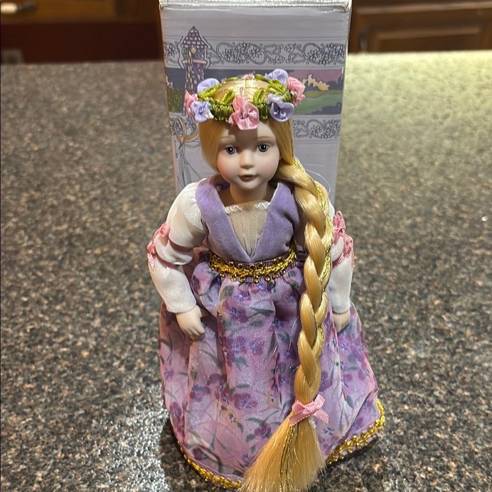 Porcelain Doll with Floral Dress and Braided Hair Avon Rapunzel 1986